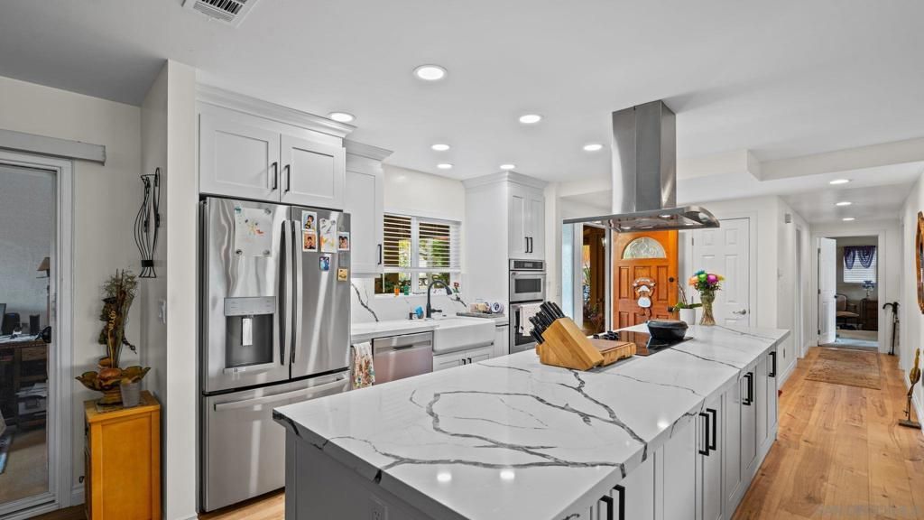 Photo of 1026 La Reina Dr, San Marcos, CA 92078 (MLS # 260009689SD)