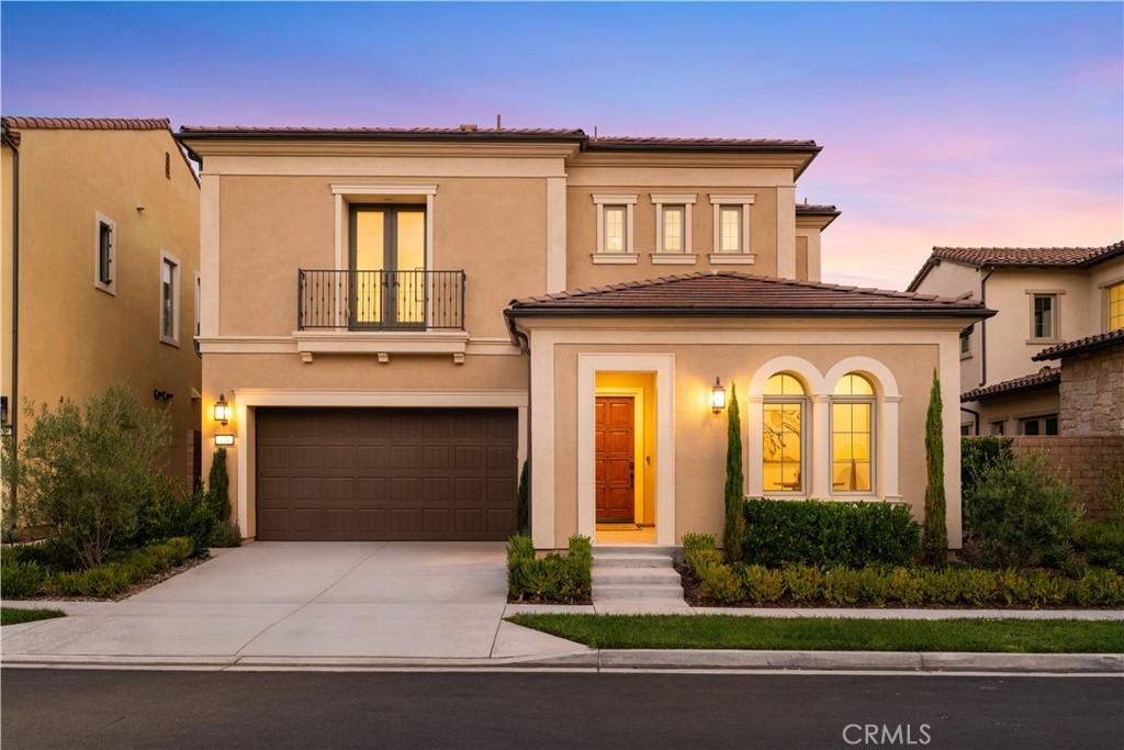 In the prestigious guard-gated community of Orchard Hills in Irvine, this elegant residence offers refined living with unmatched convenience and luxuries.
Surrounded by acres of lush greenery, palm-lined views, and breathtaking mountain scenery, Orchard Hills provides a serene, family-friendly atmosphere alongside resort-style amenities, including a Junior Olympic pool, wading pool, spa, tennis and basketball courts, picnic areas, club room, and year-round community events. Top-rated schools, parks, and scenic trails further enhance the appeal of this highly coveted neighborhood.
Inside, the home features thoughtful design and modern luxury. Beyond the welcoming foyer, a versatile flex space offers the perfect setting for a home office or guest room. The chef's kitchen boasts a timeless white palette, complete with stainless steel appliances, a chic backsplash, and a walk-in pantry. Expansive windows fill the open living and dining areas with natural light, while seamless access to the private yard makes entertaining effortless. White plantation shutters and recessed lighting accentuate the homes bright, sophisticated style.
Upstairs, a cozy loft provides additional living space. The primary suite is a tranquil retreat with a walk-in closet and a spa-inspired bath featuring dual vanities, a soaking tub, and an oversized glass shower. Two secondary bedrooms share a connected bath with another soaking tub and separate shower, while an additional bedroom offers its own Juliet balcony. In total, the home includes three soaking tubs and thoughtfully designed secondary spaces—including a private bonus area with a wine fridge—ideal for working from home or hosting guests.
Enhanced with solar panels and a versatile layout suited to a variety of lifestyles, this unique home combines everyday comfort with elevated style—all within one of Irvine's most sought-after communities.