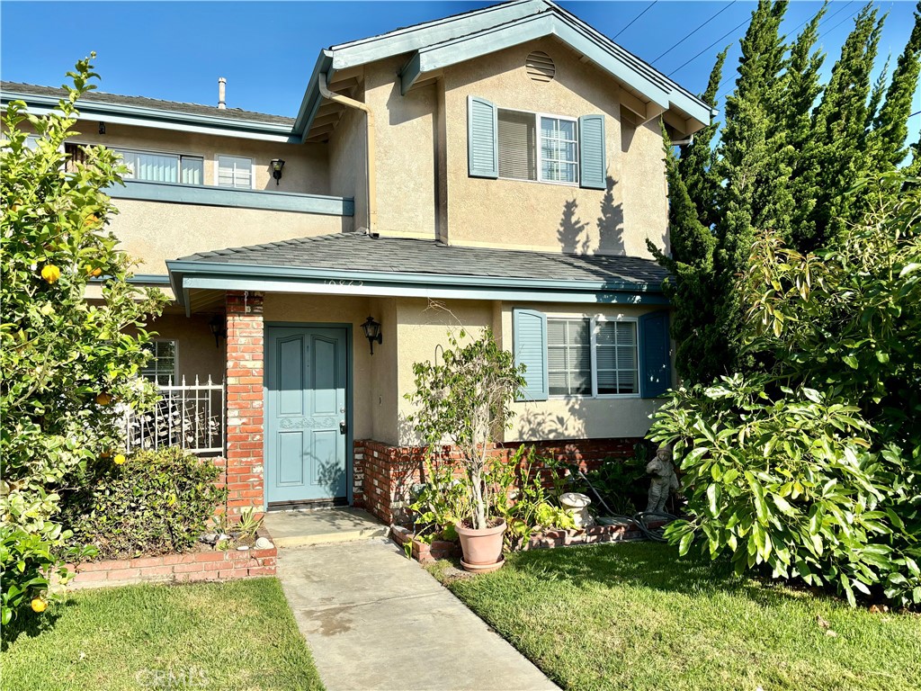 Welcome to this beautifully updated and freshly painted 3-bedroom, 2-bathroom first-floor apartment, ideally located just minutes from shopping, dining, major freeways, and the beach. This spacious home features modern laminate wood flooring throughout and a bright, open layout designed for comfort and functionality. The kitchen is equipped with sleek quartz countertops, a stainless steel gas range, and a dishwasher, making it perfect for both everyday living and entertaining. In-unit laundry hookups add convenience, while central heating and air conditioning ensure year-round comfort. The primary bedroom includes an en suite bathroom with a dual-sink quartz vanity and a walk-in shower, while the second bathroom offers a full bathtub and matching quartz finishes. The apartment also includes a 1-car attached garage with direct access and an additional assigned parking space. Water and trash are included in the rent. Applicants must have a credit score in mid 600s or higher and an income of at least three times the rent. No pets or smoking are permitted. Don’t miss the opportunity to call this move-in-ready home yours!