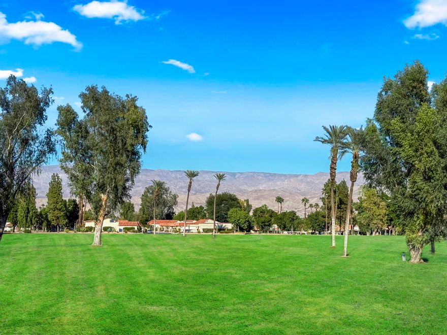 Located in the heart of Palm Desert, this beautifully updated 2 bedroom, 2 bath condo in the Palm Desert Resorter captures the essence of desert living. Enjoy fabulous east-facing fairway and mountain views from the extended covered patio, perfect for morning coffee or relaxing evenings. The kitchen has been opened up to create a bright, inviting space with new cabinetry and a seamless flow into the living area. Both bathrooms have been tastefully updated, and the home features tile flooring throughout  except  planked vinyl flooring in the bedrooms for a warm, modern touch. A 2-car garage has been added for convenience and additional storage. Experience resort-style living at its best with golf, tennis, pickleball, bocce ball clubhouse amenities, 20 pools and spas and a vibrant social atmosphere--all within the gates of this sought-after Palm Desert community.  Short term rentals are allowed.