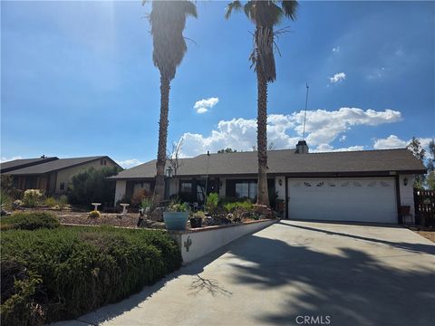 Photo of 11568 Low Chaparral Drive, Victorville, CA 92392 (MLS # HD25199578)