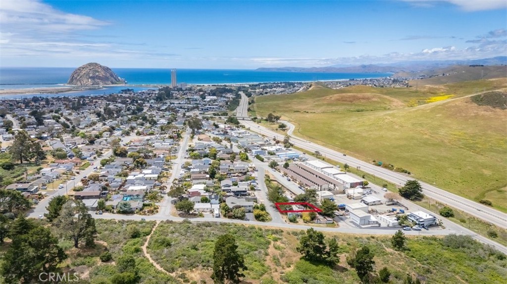 Prime Investment Opportunity in Coastal Morro Bay!
Located just steps from the scenic Morro Bay State Park and minutes from the iconic Morro Rock Beach, this rare offering presents a versatile development opportunity in one of California’s most desirable coastal towns. Situated on a semi-private lot nestled between just two adjoining parcels, this property offers a sense of privacy while maintaining easy access to key local amenities.
Currently featuring a tear-down structure, the site is primed and ready for redevelopment—with all utilities already connected, saving time and cost on initial groundwork. Zoned for medium density use, this lot allows for a range of residential development possibilities, whether you’re looking to build your dream coastal getaway, a multi-unit investment property, or a modern single-family residence with additional units for income potential.
Adjacent to a second available lot (sold separately), buyers have the option to expand their footprint and take full advantage of the area’s flexible zoning to create a larger-scale project or a more spacious estate. Together, the combined parcels open the door to creative configurations and increased building potential—perfect for developers, investors, or visionaries seeking a unique slice of the Central Coast.
The location is a standout—bordering the peaceful greenery of the State Park while remaining just a short drive from downtown Morro Bay’s shops, restaurants, and waterfront activities. With easy access to Highway 1, commuting to San Luis Obispo, Cambria, or other neighboring beach towns is a breeze.
Whether you’re a seasoned investor or a first-time builder looking for a special place to create something extraordinary, this property offers unmatched potential in a prime location. Don’t miss this chance to secure a piece of coastal California with flexibility, privacy, and strong future returns.
Please note: Property is being sold for land value only. Adjacent lot available under separate listing.
***DANGER! DO NOT ATTEMPT TO ENTER ANY STRUCTURES DUE TO VERY HAZARDOUS CONDITIONS**