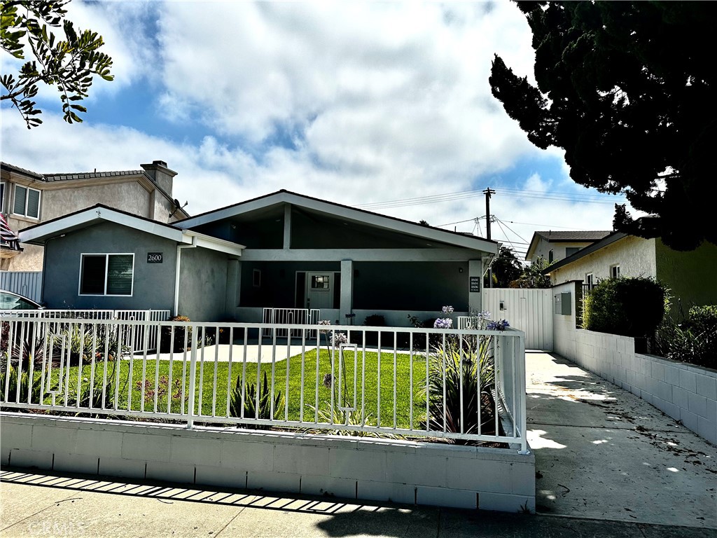 Property was originally built in 1951, but the new owner did a rebuild in both buildings in 2018-2019 from the studs ! There are 4 units on property. Front SFR is completaly separate. Second building with separate gated entry with 3 unit, is 2 story. Each unit has its own address and is completely redone: new hardwood floors, windows, appliances, wall heaters. 2602 has even view of Palos Verdes, has spacious living room that opens to kitchen, master bedroom and additional bedroom with full bathroom in hallway. There is also Laundry room , used by 2 other units.Each unit has its own water heater.