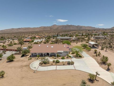Photo of 9255 Del Monte Avenue, Yucca Valley, CA 92284 (MLS # 2600138SD)