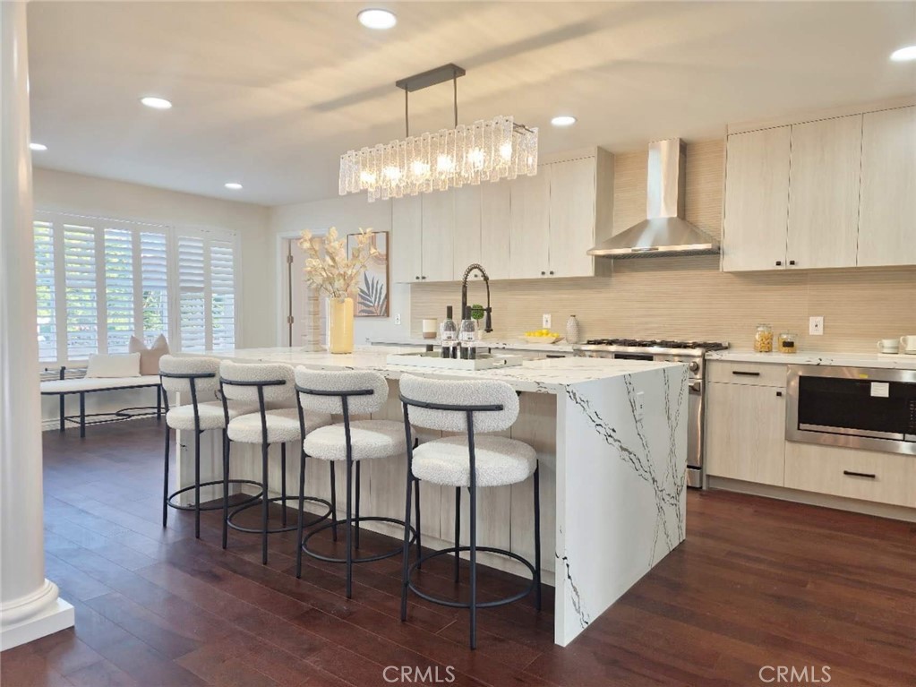 Opportunity to Own a Fully Upgraded Single-Story 4-Bedroom, 3-Bath Home in a Wonderful Brea Neighborhood!
Welcome to this beautifully renovated home located in a quiet, family-friendly community. Step inside to discover an inviting open-concept living space filled with natural light — perfect for cozy family evenings or entertaining guests. The chef-inspired kitchen features a white quartz island, sleek paneled cabinetry with matte black pulls, stainless steel appliances, and recessed lighting, flowing seamlessly into the dining area.
The expansive master suite offers a true retreat, complete with walk-in closets and a brand-new, spa-like master bathroom featuring quartz countertops, a luxurious walk-in shower, and a separate soaking tub. A second suite also includes its own private bathroom, ideal for guests or multi-generational living. The third bathroom delivers a tranquil, spa-like ambiance with a full-size tub, floating sink, modern fixtures, and designer lighting.
Throughout the home, brand-new solid wood flooring adds warmth and elegance. Step outside to enjoy the lush, professionally landscaped front and backyards, bursting with vibrant flowers and green grass. Relax with your morning coffee on the back porch or host a lively BBQ in the private backyard oasis.
Located in a desirable, peaceful neighborhood, this home is close to top-rated schools, beautiful parks, and convenient shopping and dining options.
Don’t miss this rare opportunity — your dream home awaits! This one won’t last!