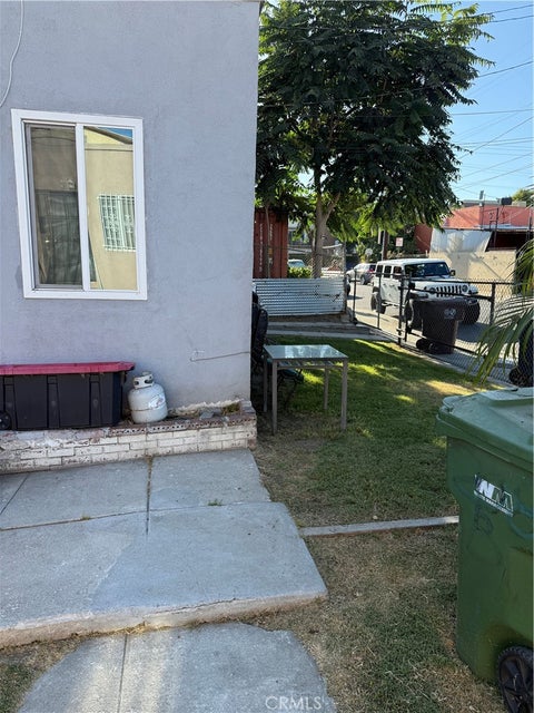 Photo of 208 E Poplar ST, Compton, CA 90220 (MLS # SB26196809)
