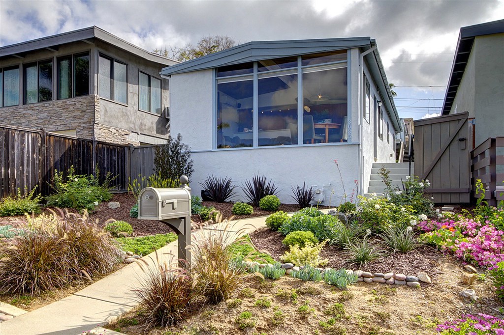 This bright and airy home is just waiting for you to call it home. Boasting scenic views of Mission Bay, the single level open concept home features a bright kitchen with new counters, new Shaker style cabinets and stainless steel appliances. Laminate floors and custom wood-beam ceilings add a warm, cozy feel to the home, and the bathrooms have been upgraded with granite. The master features a huge closet with shelving and storage system. Neighborhoods: Bay Park Equipment: Dryer, Range/Oven, Shed(s) Other Fees: 0 Sewer: Sewer Connected