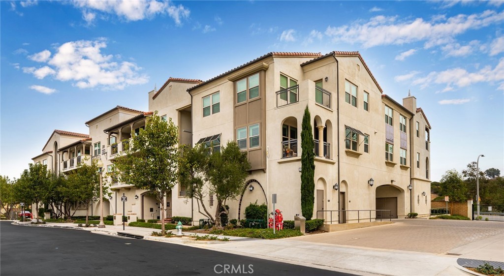 This is a BEAUTIFULLY Designed & UPGRADED ONE-LEVEL, Top Floor Condo with Semi-Private Elevators & Lobbies * * WELCOME to the Master Planned Gated Community of La Floresta..55+ Age Qualified Community!! PREMIUM TOP FLOOR - ONE LEVEL UNIT * * Come Enjoy this OPEN CONCEPT Floor-Plan Offering 1553sqft with 2 LARGE Bedrooms, DEN/Office or Craft Room (possible 3rd bedroom) and 2 FULL Bathrooms * * EXPANSIVE Living Room with PRIVATE BALCONY to Enjoy the Surrounding Views & Cool Breeze * * WONDERFUL ISLAND Kitchen with Breakfast Bar, QUARTZ Counter Tops & Custom Back-Splash, STAINLESS STEEL Appliance Package including the REFRIGERATOR and Breakfast Nook to Enjoy Your Morning Coffee * * UPGRADED Throughout with PLANTATION SHUTTERS, Gorgeous Wood Laminate Flooring, White Cabinetry & Quartz Counters, Raised Panel DECOR Doors, DESIGNER FIXTURES, Recessed LED Lighting and MUCH MORE * * PRIMARY Bedroom with HIGH Ceilings and PRIVATE Bathroom with His & Her Sinks, CUSTOM TILED Walk-In Shower and SPACIOUS Walk-In Closet * * Nicely Appointed 2nd Bedroom and a Den/Office could be used for a 3rd Bedroom * * INDOOR LAUNDRY ROOM includes the WASHER & DRYER * * Large 2 Car Attached Garage with Separate Storage Room * * WONDERFUL Location is Close to Shopping, Dining/Restaurants, Parks and EZ Freeway Access - WONDERFUL Home and WONDERFUL Location!!