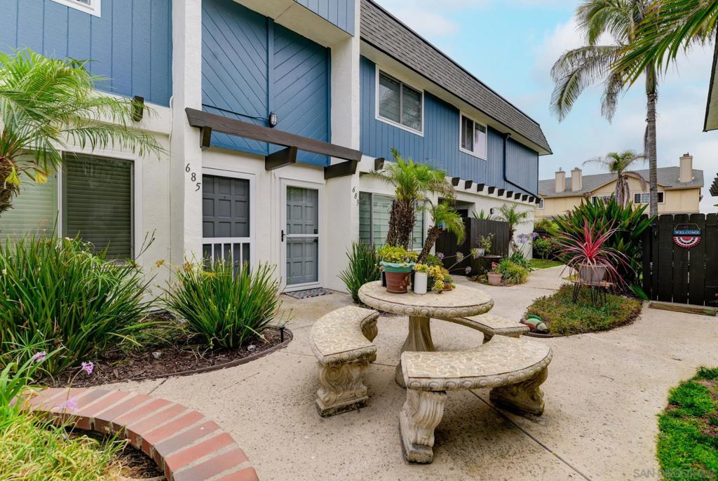 Imperial Beach Living! Just across the street from the beach. This VA-approved, move-in ready end-unit townhome offers the best of coastal living. Enjoy a bright, open floor plan downstairs with a private patio and an attached garage. Upstairs features has primary bedroom, in-unit laundry included. Nestled in a charming courtyard with lush landscaping, shared laundry, and extra storage. Walk to popular restaurants, local shops, parks, and the beach. Close to military bases and public transportation. This is a rare find in a fast-growing coastal community! Whether you're looking for a beach retreat, full-time residence, or investment.