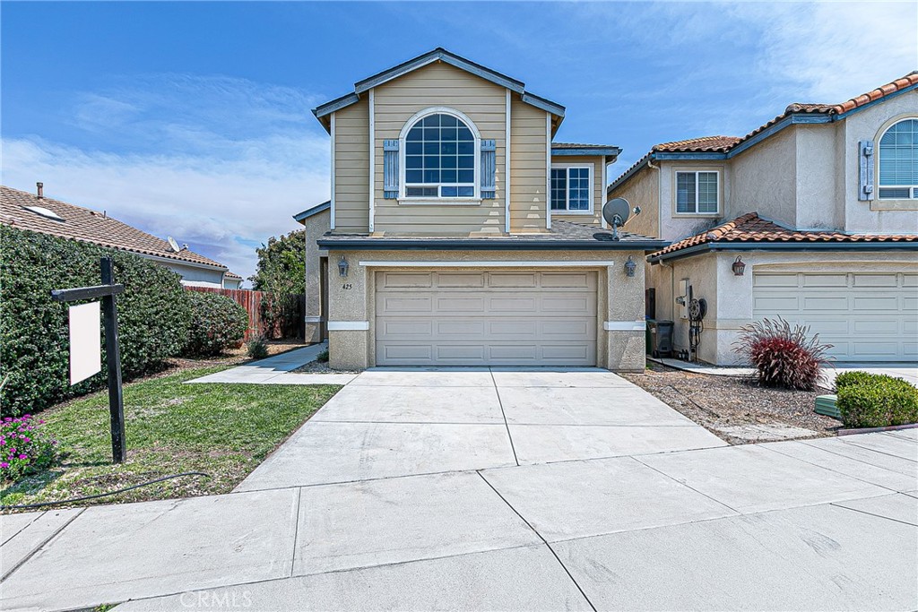 Welcome to 425 Bakeman Ln, a beautiful two-story home located in the heart of Arroyo Grande. Recently painted on the interior, this 2007 built modern architectural beauty offers 3 spacious bedrooms and 2.5 baths, providing 1,569 square feet of comfortable living space. As you step inside, you'll immediately be captivated by the open concept layout, perfect for entertaining or enjoying cozy family moments. Abundant natural light floods every corner, creating an inviting and airy atmosphere throughout the home. The master bedroom is a true retreat, offering ample space, serene light, and a private en-suite bath. Two additional well sized bedrooms provide plenty of room for guests or a growing family. Outside, the spacious driveway offers convenience, providing plenty of parking for you. Located in one of the most desirable areas, this home is surrounded by excellent school districts, nearby parks, and top medical facilities. Plus, you're just minutes away from the serene beauty of Pismo Beach and the vibrant life of San Luis Obispo. Enjoy weekends at local vineyards or outdoor adventures on the coast it's all at your fingertips. Don't miss the opportunity to call 425 Bakeman Ln home location, location, location!