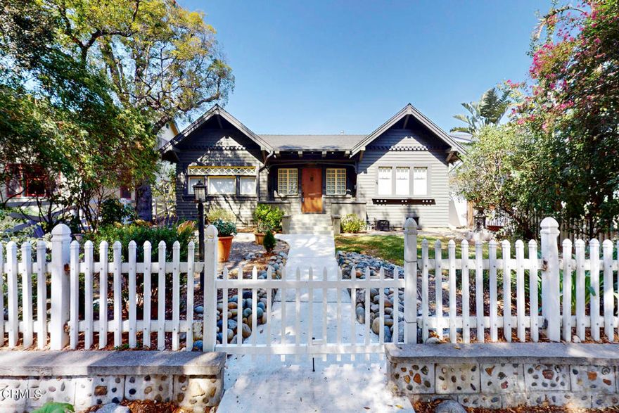 This wonderful Two on a lot, in one of North East Pasadena's finest neighborhoods boasts  3 bedrooms and 2 bathrooms. The front house is a perfect blend of modern comfort and classical  details. There is an updated kitchen with a marble island and countertops, dishwasher, fridge, antique O Keefe and Merritt stove, decorative  tile floor and backsplash. A running theme for the house is recessed lighting, lots of windows, and natural light. The living room has a Batchelder-esque fireplace, built in bookshelves , a Nest thermostat with central A/C and heat, and refinished hardwood floors. The dining room has a faux sky painted ceiling with built in cabinets. There is both a den and a family room with a built-in laundry closet (washer and dryer included), skylight, built in shelving, a projector screen, and surround sound speakers. Enjoy a patio in the backyard, professionally landscaped front and back yards, and a circular brick patio in the front yard. See it today it will not last!!!
