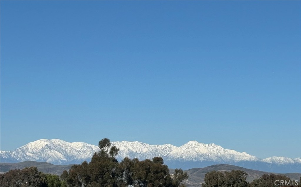 **HUGE PRICE REDUCTION**Charming Single-Story Home with Mountain Views!
This beautifully updated 3-bedroom, 2-bath single-level detached home with 1,913 sq.ft living space and 9,450 lot size (approx) offers a spacious open floor plan perfect for comfortable living and entertaining. Enjoy views of snow-capped mountains from your own backyard! Step into the large living room featuring vaulted ceiling, cozy fireplace that opens to the dining area. A bright remodeled kitchen with white cabinetry, newer appliances, sleek quartz countertops, soft-closing cabinets and drawers and ample cabinet space. The spacious family room features vaulted ceilings, wet bar and glass double doors that open to a low-maintenance backyard — ideal for relaxing or entertaining guests.The expansive master suite features a double-door entry, vaulted ceiling. a huge walk-in closet with mirrored doors, and its private access to the backyard. The en-suite bathroom has been tastefully remodeled with a walk-in shower, double sinks, quartz countertops, and modern fixtures.
The second bathroom also has been beautifully remodeled, showcasing a spacious walk-in shower with sleek tile finishes, white cabinetry, quartz countertops, and updated fixtures for a clean, modern look.
Additional features include newer roof, double-pane windows and doors, newer central A/C and heating system, newer Air ducts, re-piped plumbing, wood shutters, rain gutters, ceiling fans, a glass door with backyard views from both the master bedroom and family room, and plenty of natural light throughout the home. close to schools, shopping centers, parks, golf course and fwys.