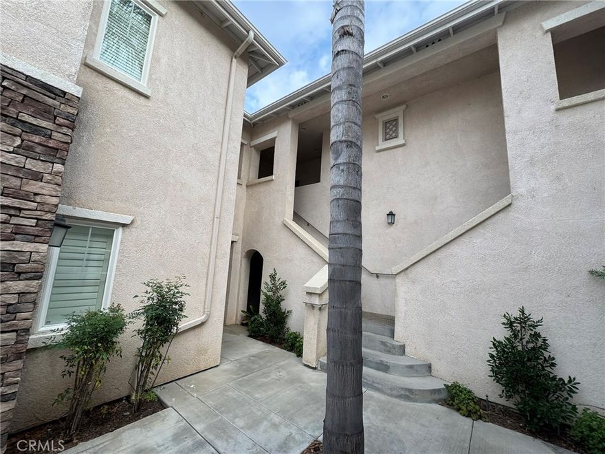 CLEAN - TURNKEY - 2 Bedroom / 2 Bath WITH an Office/Bonus room.  This beautiful Verona Community HOA, upstairs unit. Include an open floor plan with a large open living area, Features; Neutral paint, newer laminate vinyl plank wood flooring, gas fireplace, lighted ceiling fan, window blinds and patio. Office/bonus room convenient if you require that extra space. Kitchen with laminate counters, stainless steel appliances include; Four burner gas stove, built-in microwave, dishwasher and refrigerator. Dual stainless sink with disposal & lots of cabinets. Primary bedroom with mirrored wardrobe closet doors, lighted ceiling fan and primary bathroom.  Convenient Hallway bath near the guest bedroom. Stacked washer/dryer in hallway closet. Detached single car garage. HOA amenities include; pool, hot tub, BBQ/picnic area, fitness center. Close to schools, I-15 Freeway ramps, shopping, restaurants, wineries & more.