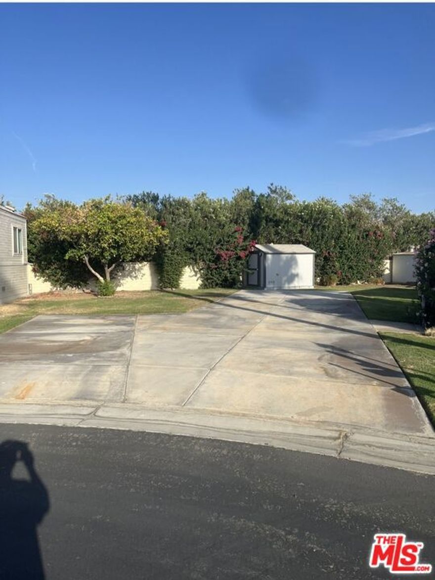 This is inside a cul de sac at this prestigious RV park. It is in the middle, so it has a nice pie shape up against the fence. There is a shed that come with the property as well.  This all located in a 55+ community that has a 3 par golf course, chipping green, putting green, 9 hole mini golf, pickleball and tennis courts, bocce ball, an indoor shuffleboard courts, 2 clubhouses with pools and jacuzzies and an additional 4 satellites with pool, jacuzzies and mail boxes. This is all within a 24 hour gate guarded community of 801 lots, that consist of a combination of Park Models and RV lots, where you own the land. The resort has a limit of 270 day occupancy. It is a perfect place to spend your holidays in the sunshine.
