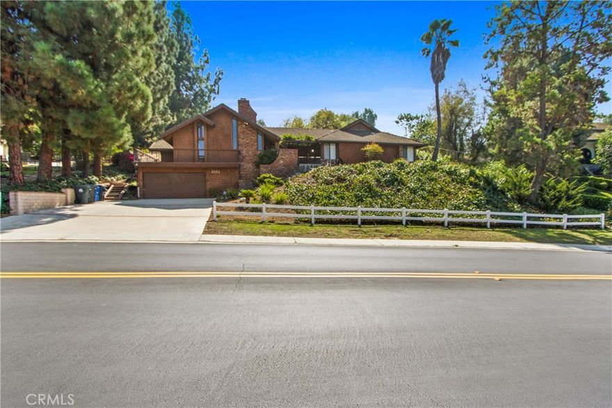 Exceptional opportunity to own a single story home in The Country Estates with an abundance of usable land. Features a bright open floor plan with elegant Japanese accents throughout. Great flow with high ceilings in the living room that contains a cozy fireplace. There are four bedrooms including a large master suite with a soaking tub. The backyard features a refreshing pool and spa and elevates to flatter lands. The perfect property to entertain in a serene and tranquil setting. With a 24-hour guard-gated community, world class clay tennis courts, indoor basketball court, and clubhouse, this property boasts all of the amenities. Enjoy a luxury lifestyle at an unbeatable price.