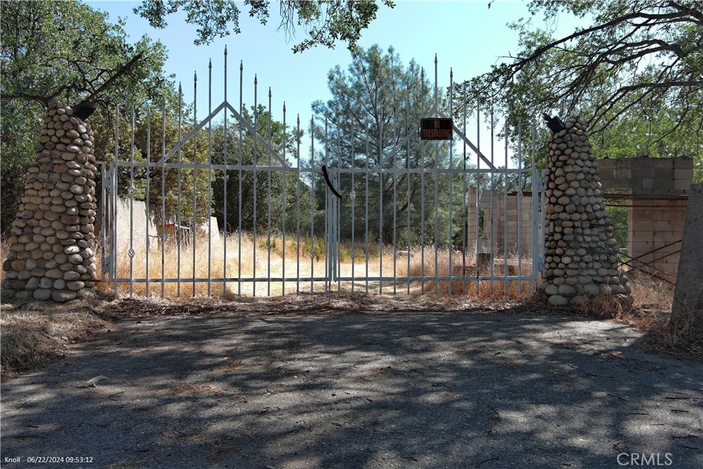 Come see this enchanting DIY property spans 6.04 acres of beautiful, usable land, offering a unique opportunity for those with a vision for transformation. The partially built castle evokes the magic of Snow White, with whimsical details and fairy tale charm. It stands prominently near a captivating rod iron Stonehenge gate, adding a touch of medieval grandeur to the landscape.
Adjacent to the castle is a distinctive shiplap house, exuding rustic elegance and providing a cozy living space. Two additional outbuildings, thoughtfully designed to resemble the cottages of the seven dwarves, offer versatile space for guests, studios, or workshops.
With 220-volt power and a reliable well at 12 GPM when drilled, the property is well-equipped for modern living. Though it requires some TLC to reach its full potential, this fixer-upper is a rare gem for those dreaming of creating their own storybook estate.
Whether you envision a grand family home, a unique retreat, or an enchanting venue, this property offers endless possibilities. Embrace the opportunity to finish the castle, enhance the shiplap house, and transform the outbuildings into charming guest accommodations or creative spaces.
Step into a fairy tale and make this enchanting property your own!