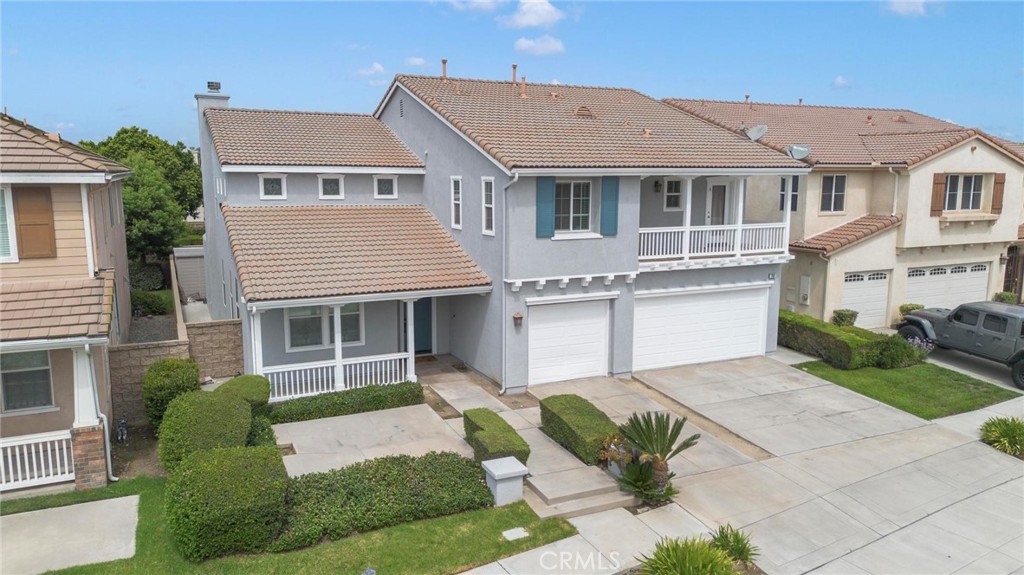 Experience luxury and comfort in this beautifully upgraded 4-bedroom, 4.5-bath Eastvale home with a dedicated office that can serve as a 5th bedroom, complete with its own full bathroom. Nearly 4,000 sq ft of living space includes a chef’s kitchen with high-end appliances, walk-in pantry, beverage fridge, warming drawer, and trash compactor. The open-concept family room features a custom stone wall, built-ins, and gas fireplace. Upstairs offers a spacious loft, laundry room, and a luxurious primary suite with soaking tub, electric fireplace, and custom walk-in closet. Additional highlights include hardwood floors, plantation shutters, tankless water heater, dual new A/C units, Google Nest, 3-car garage, and fresh exterior paint. Located in a quiet neighborhood near top-rated schools, parks, and shopping.