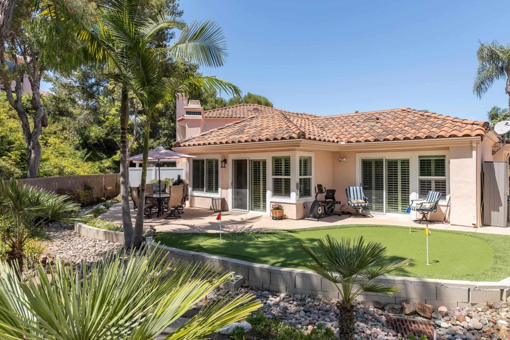 Charming Single-Story Retreat in The Colony at Lake San Marcos Tucked away in a peaceful private cul-de-sac, 1203 Via Apuesto offers a beautifully remodeled single-story home that blends elegance, comfort, and resort-style living. This 2-bedroom, 2-bath residence spans 1,383 sq. ft. and includes a versatile loft space above the garage—ideal for a office or guest retreat. Step through the welcoming front courtyard into a light-filled interior where vaulted ceilings create a bright, airy atmosphere. The spacious living room features a cozy fireplace, perfect for unwinding after a day on the lake or golf course. The gourmet kitchen boasts high-end stainless steel appliances, custom cabinetry, and a sunny breakfast nook for your morning coffee. Both bedrooms are private suites with spa-inspired bathrooms, offering a relaxing haven for you and your guests. Outside, the large backyard is a secluded sanctuary with mature trees, lush landscaping, and plenty of space for year-round entertaining. The attached 2-car garage includes built-in cabinets and a dedicated workspace, while the secure, guard-patrolled community of The Colony provides peace of mind. Living in Lake San Marcos means enjoying resort-style amenities—golfing, boating, tennis, fine dining, and a vibrant social calendar—all just steps from your door. Whether you’re seeking a full-time residence, vacation getaway, or investment property, this home offers the best of Lake San Marcos living.