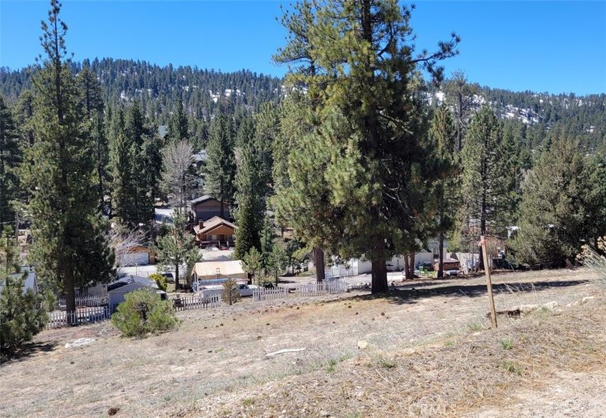 "Build your custom mountain home on this nice, elevated view lot in Boulder Bay! Beautiful, wide-open views of the mountains and tree-tops surround this gentle, down-slope lot.  Purchase includes BBL City approved floor plans  (currently active) for a 1976 sq ft. home, surveyed lot with corner markers, Topo map and Geo survey, already completed and available to buyer. Tucked away off the beaten path, this lot is just a few blocks to the lake.  Pleasure Point Marina, Boulder Bay Park and easy access from Hwy 18. The Village and ski slopes are only a short distance as well.  Excellent price and reay to build"