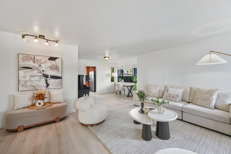 Recently remodeled end unit townhouse in a very quiet and convenient location! Walking distance to Downtown Mountain View, just minutes to Google office, Computer History Museum and Shoreline Park. Easy access to public transportation and Highways 101 and 85. This updated townhome offers three bedrooms and two-and-a-half bathrooms. On the main level, the living room features an electric fireplace, the dining room connects to the kitchen for easy entertaining, and the family room sits open to the kitchen with a wide sliding glass door to the private backyard and garage. Upstairs, the spacious primary suite has two extensive closets and a large recently rebuilt balcony, while two additional well-sized bedrooms with a shared full bath. With vaulted ceiling in the primary bedroom, new SPC floor, fresh paint, new furnace and new water heater, and many more upgrades! This home is move in ready!