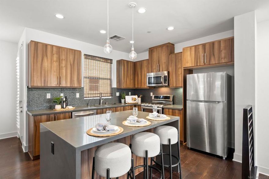 PRICED TO SELL!  Award-winning Origen at Civita – 3-story, 1,814 sq. ft., true 3-bedroom home with upgrades throughout! First floor offers a private bedroom & full bath, perfect for guests or office. The light-filled second floor features an open-concept kitchen, dining & great room with built-in office, wood floors, upgraded cabinetry & countertops, and fresh paint. Primary bath has tile all the way to the top with designer upgrades.  Third floor includes a spacious primary suite plus an additional bedroom with en suite bath. New carpet throughout bedrooms. Surrounded by windows for abundant natural light. Enjoy resort-style living with access to the Civita Master Rec Center featuring two pools (one with beach entry), a two-story gym, and event space. Steps to trails, parks, and centrally located near shopping, dining & major freeways. Move-in ready!  Award-winning Origen at Civita – 3-story, 1,814 sq. ft., true 3-bedroom home with upgrades throughout! First floor offers a private bedroom & full bath, perfect for guests or office. The light-filled second floor features an open-concept kitchen, dining & great room with built-in office, wood floors, upgraded cabinetry & countertops, and fresh paint. Third floor includes a spacious primary suite plus an additional bedroom with en suite bath. New carpet throughout bedrooms. Surrounded by windows for abundant natural light. Enjoy resort-style living with access to the Civita Master Rec Center featuring two pools (one with beach entry), a two-story gym, and event space. Steps to trails, parks, and centrally located near shopping, dining & major freeways. Move-in ready!