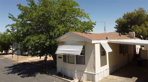 Photo of 23456 Ottawa Rd Rd #19, Apple Valley, CA 92308 (MLS # HD26082120)