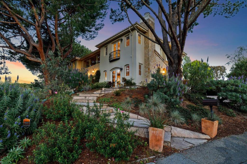 Perched on a 14,050 sq ft lot nestled between stately pines, this 4 bed 4.5 bath custom built masterpiece is the quintessence of luxury, blending timeless European architecture with a modern floor plan, contemporary comfort and state of the art home technology. This private sanctuary is perfectly placed to take full advantage of the best that Sharon Heights has to offer, superb location and captivating views. Custom french white oak flooring in the foyer lends a view to the light, bright sophisticated yet inviting open floor plan which immediately showcases indoor and outdoor living at its finest.The enormous and well appointed gourmet chef's kitchen/family room takes center stage with a waterfall edge quartz island featuring top-tier Wolf, Miele and Sub-Zero appliances. This is the central hub for both formal and casual entertaining anchored by French doors uniting the front deck w/ casual seating, dining & to the lavish rear grounds designed by acclaimed landscape architect K.Willig