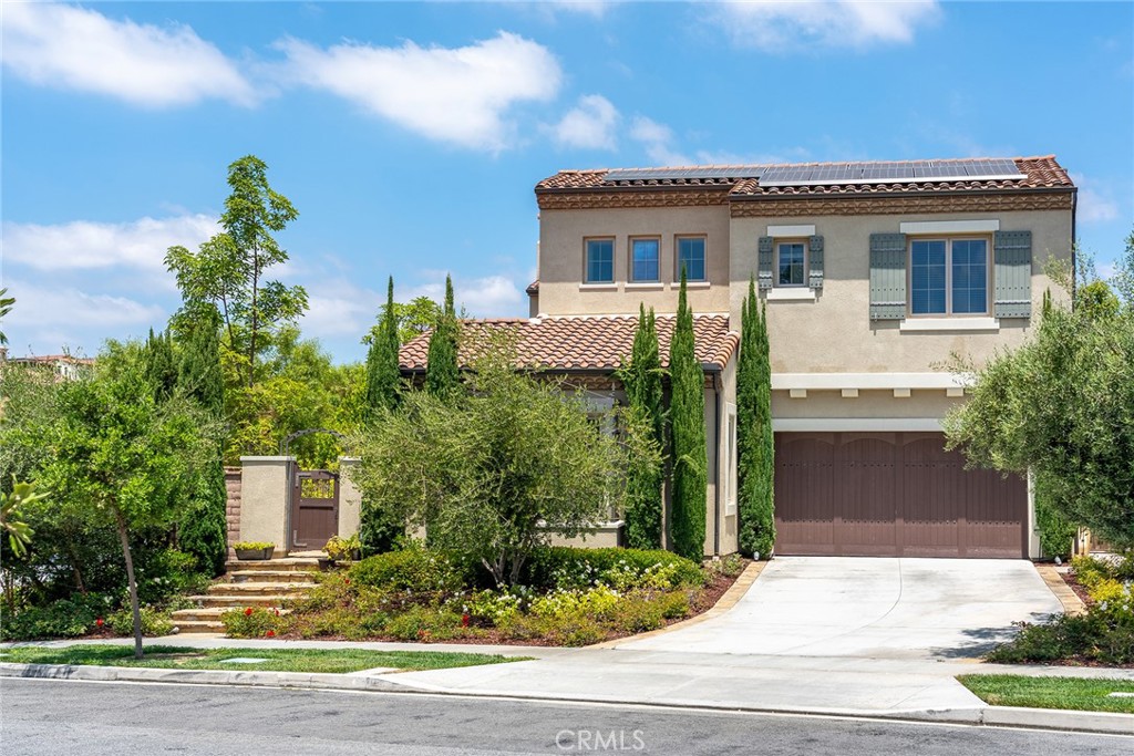 Location! Location! Location! Corner Lot! Only few Mins Walking distance to school.This luxury two-story residence boasts 4,274 sq.ft. of living space on a generously sized 7,815 sq.ft. lot. in the guard gated Groves of Orchard Hills—an entertainer’s dream and a luxurious retreat all in one. Features 5 bedrooms and 5.5 bathrooms, including two primary en-suites, one on each floor for ultimate flexibility and privacy. With 2 bedrooms downstairs and 3 upstairs, this layout is ideal for multi-generational living or hosting guests. Step inside to find an open floor plan with plenty of natural light, with many windows and high ceilings that create an airy, inviting ambiance. The gourmet kitchen, complete with a spacious island, Quartz countertops, high-end appliances, and a built-in mini wine refrigerator, seamlessly connects to the family room. Step outside to your personal Orchard Hills, and huge area could be built your outdoor fireplace, BBQ or Private SPA. Enjoy the resort-style amenities of Orchard Hills, including pools, clubhouses, tennis courts, and walking trails. Located within walking distance to the Orchard Hills Shopping Center and award-winning K-8 Orchard Hills School, with easy access to parks, preserves, and major freeways.