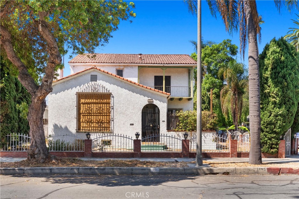 This is a one of a kind opportunity! An amazing fixer upper home with tons of historic charm and a HUGE BASEMENT, on an oversized lot in the highly sought after Rose Park Historic District of Long Beach. Located just steps from Rose Park, 795 Gladys Avenue boasts 2,514 square feet of living space and a unique floorplan where every room is grand in scale. The old saying is true... they just don't make them like they used to. No joke, the possibilities are endless here! The home features a private courtyard entrance, a huge living room with a fireplace, many windows that let in a tremendous amount of natural light and cool breezes, an expansive dining room that is bigger than most people's living room that is located just off of the centrally located kitchen, 3 bedrooms, 2 bathrooms, another room that could be used as either an additional bedroom, office, or den, and perhaps the most unique part of the home, a HUGE BASEMENT. In addition, the home features a detached 2 car garage with a finished attic, a large laundry room, and an additional bathroom behind the garage. The oversized lot is 6,753 square feet, and features a tremendous amount of outdoor space with endless potential. In terms of location, it doesn't get any better than this. The home is located in the Rose Park Historic District, just steps from Rose Park, and conveniently located near shopping, dining, entertainment, major transit, parks, and so much more. This is a truly unique home that just needs someone to come in and breathe some new life into it. I can't emphasize enough how unique and large the downstairs basement is. Trust me, come check it out. You won't be sorry!