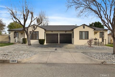 Photo of 1580 Bradford St, Pomona, CA 91767 (MLS # CV26039494)