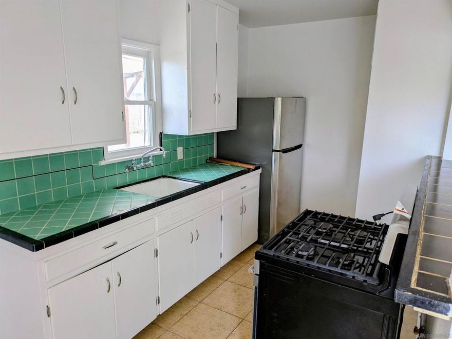 Located 2 blocks from the beach. Off-street parking. The large backyard has a covered deck and parking that is inside the fence. Storage shed. Newly tiled bathroom. New paint inside.  We do credit and background checks on all applicants.