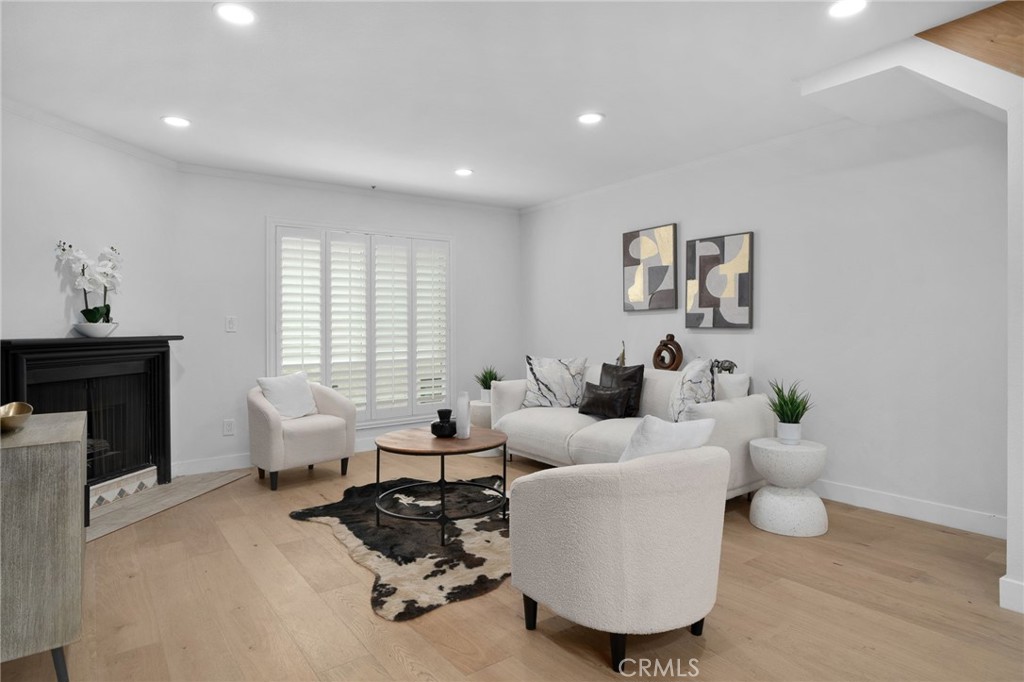 Welcome to this stylish and spacious 2-bedroom, 2.5-bath townhouse-style condo in a gated community in the heart of North Hollywood! This bright and airy home features an open floor plan with a combined living and dining area, warm wood floors, a cozy fireplace, and high ceilings with recessed lighting. The kitchen offers breakfast bar, and stainless steel appliances, perfect for daily living and entertaining. Both bedrooms have their own Full bathrooms and lots of closet space. The unit has a private roof top area, you’ll also enjoy in-unit laundry, central A/C, and two gated parking spots in a secured garage. The well-maintained complex has controlled access, Pool and Gym, It’s just minutes from the NoHo Arts District, universal studios, major film academies, restaurants, shopping, and public transportation. A perfect mix of comfort, convenience, and location, don’t miss the chance to make this North Hollywood gem your new home!
