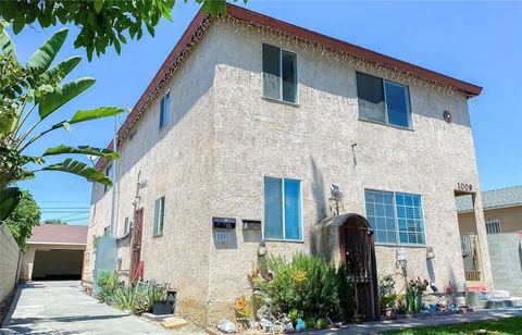 Photo of 1009 E Stockton Ave, Compton, CA 90221 (MLS # OC26064278)