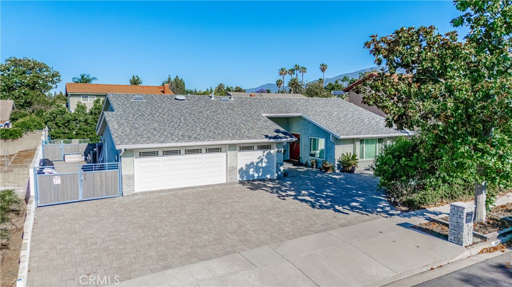 Nestled at the end of a quiet cul-de-sac on Balboa Way, this beautifully appointed 2,309 sq ft residence welcomes you into a world of elegance and ease. Step inside to a formal living and dining area—ideal for gatherings under vaulted ceilings and warm natural light. The home flows into a stunning open kitchen with a five-seat island, perfect for casual meals or evening chats, all overlooking a family room where higher ceilings enhance the sense of space and togetherness.
The master suite is a true retreat, with sliding doors opening to the backyard oasis. Inside, dual walk-in closets—thoughtfully designed with drawers, shelves, and ample hanging space—keep everything organized, while the ensuite bathroom features his-and-hers vanities, a luxurious standalone shower, and custom-built cabinets. Three additional bedrooms and a second full bath provide flexible space for family, guests, or a home office.
Outside, a sparkling pool and spa anchor the backyard, surrounded by fruit trees and framed by mountain views. A covered patio and built-in barbecue make outdoor living effortless, while RV access and a driveway for five cars offer practical perks. The three-car garage with epoxy flooring connects to a laundry room that includes a washer, dryer, and all kitchen appliances: fridge, stove, microwave, and dishwasher.
Just blocks from Pepper Tree Elementary (8/10), half a mile from Pioneer Junior High (9/10), and 1.7 miles from Upland High School (8/10), the home lies within the acclaimed Upland Unified School District, known for strong academics and a supportive community.
Beyond the schools, Upland offers a lifestyle rich in charm and convenience. Historic Downtown Upland features nearly 200 shops, cafés, breweries, and a seasonal farmers market. Along Foothill Boulevard, enjoy Route 66 nostalgia, the Madonna of the Trail monument, and iconic diners under the original golden arches. Nearby attractions like Castle Park, Bullwinkle’s, Level Up Brewcade, and Nickel-Nickel arcade promise fun for all ages.
With easy access to I-10, SR-210, and the nearby Upland Metrolink station, commuting across the Inland Empire or into Los Angeles is a breeze.
Every corner of this home invites joy—whether you’re sipping coffee by the pool, gathered around the kitchen island, or exploring the neighborhood. With room for RVs, fruit trees, mountain views, and access to top-rated schools, 1817 Balboa Way is more than a home—it’s your next chapter.