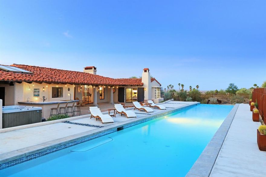 Welcome to La Casa de la Estrella, a thoughtfully designed Spanish villa located in the heart of the Anza-Borrego Desert state park! Surrounded by six hundred fifty thousand acres of serene desert, Casa de la Estrella is perfect for those looking to disconnect.  From the moment you enter through the large, dark gothic doors, you will find yourself immersed in an environment rich in Spanish culture and ready for relaxation. Casa de la Estrella is a 2,750 square foot villa with an 80 ft lap pool complete with a waterfall edge. There are two fire pits; one in the back and one in the front courtyard which are great for making s'mores with the family. The outdoor bar features a mini frig, sink and built in BBQ and is conveniently located next to the hot tub. Features include: solar, high speed internet, new faucets, sub zero refrigerator, washer/dryer, dishwasher, stove, digital door entry locks, Nest thermostats, new King mattresses & furnishings. Property is located in the desirable gated community of  Rams Hill which offers a Tom Fazio golf course, hiking, biking, jeeping and all the desert has to offer. Adjacent lot included.