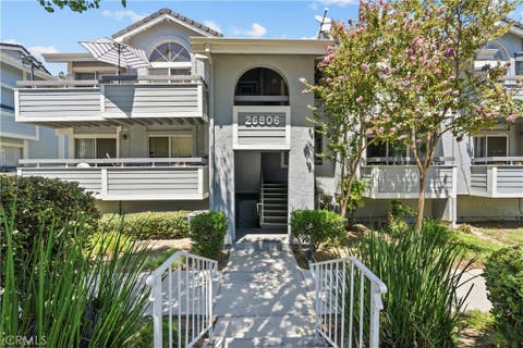 Photo of 26806 Claudette Street #323, Canyon Country, CA 91351 (MLS # SR26175171)