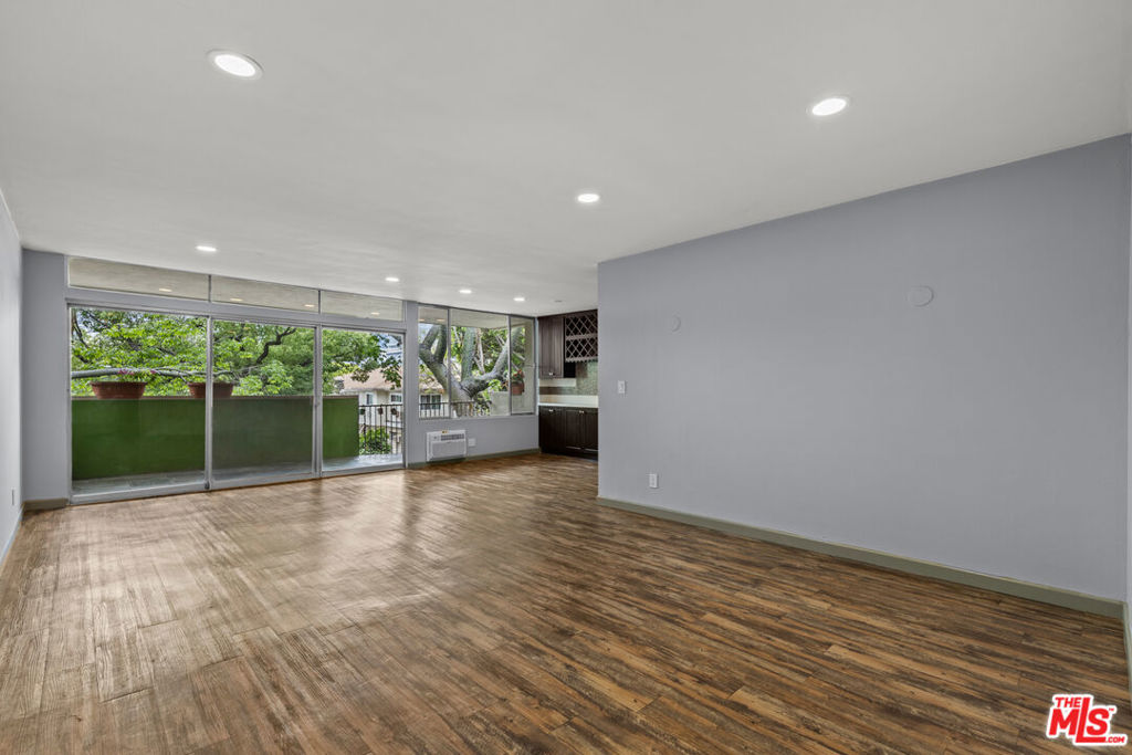 Location, location, location! Welcome home to your spacious and thoughtfully updated condo nestled in the heart of West Hollywood. This 2 bedroom, 2 bathroom home sprawls 1,221 square feet and comes equipped with a galley kitchen, dining area, a generous patio balcony, in-unit washer and dryer, dishwasher, a walk-in storage closet, and much more. The unit also includes 2 side-by-side parking spaces in a secured garage. The well-maintained building offers a pool in the center courtyard, a secured entrance, a lobby, and elevators.