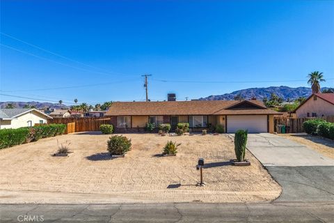 Photo of 74009 Samarkand Drive, 29 Palms, CA 92277 (MLS # JT26092913)
