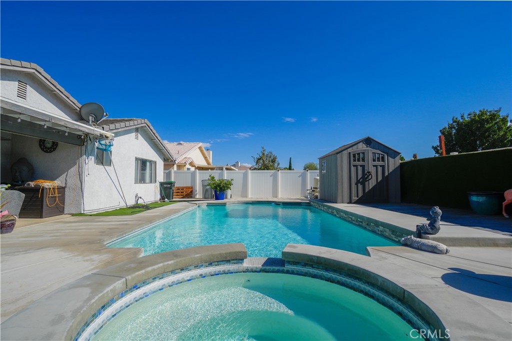 Beautiful POOL home in Spring Valley Lake community. Walk into a beautiful 1.803 sq. ft. home featuring 3 beds and 2 baths and bonus room with laminate flooring, kitchen features quartz countertops, double oven and an island. Covered back patio to enjoy your POOL!! and a 2 car garage. MUST SEE TO APPRECIATE!!!