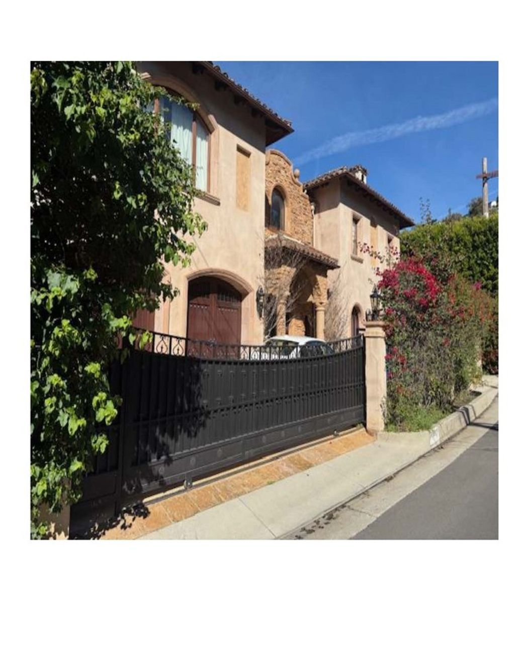 Photo of 1191 N Bundy Dr, Los Angeles, CA 90049 (MLS # OC26036582)