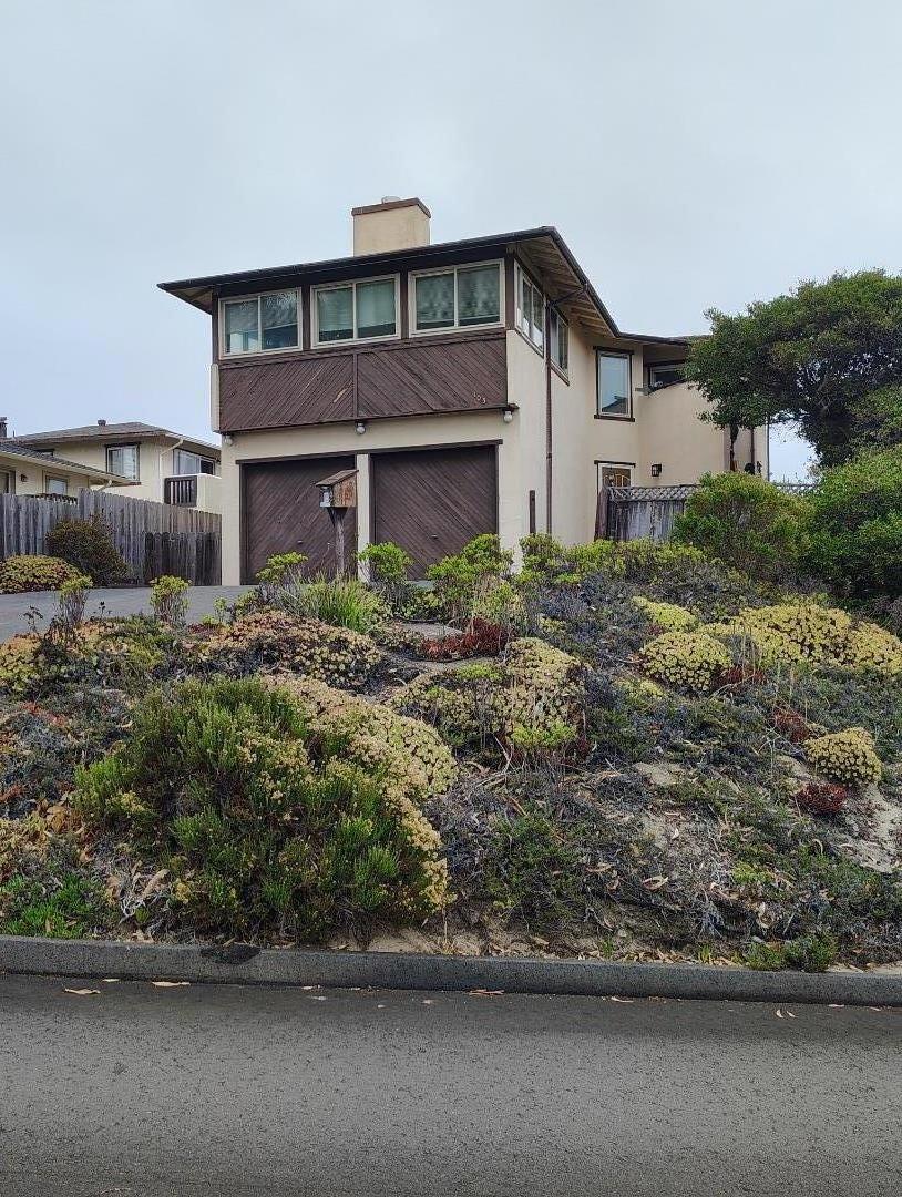 Welcome to this charming 4-bedroom, 2-bathroom home located in the beautiful city of Monterey. With a spacious 1,918 sq ft of living space, this property offers a comfortable and inviting atmosphere. The kitchen is well-equipped with a ceramic countertop, oven range, and refrigerator, making it perfect for culinary enthusiasts. The open family room and kitchen combo is ideal for gatherings, while the separate dining area adds a touch of elegance for formal meals. The home features a mix of carpet, tile, and wood flooring, providing both comfort and style. A cozy fireplace serves as a focal point for relaxation. The bathrooms, conveniently located on the ground floor, boast double sinks and a shower and tub with tile finishes. Laundry facilities are located in the house . The garage offers two parking spaces. Energy-efficient triple pane windows enhance the home's comfort. Situated on a 6,098 sq ft lot, this home falls within the Monterey Peninsula Unified School District, making it a practical choice for families. Few minutes drive to schools. Few minutes walk to the Del Monte Beach . Near bus stop , restaurants ... Need a little works more and this house will be very nice home in a beautiful area .