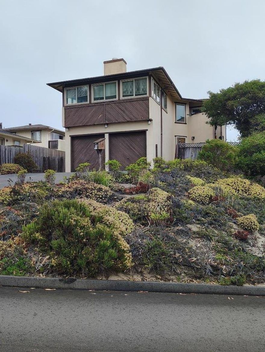 Welcome to this charming 4-bedroom, 2-bathroom home located in the beautiful city of Monterey. With a spacious 1,918 sq ft of living space, this property offers a comfortable and inviting atmosphere. The kitchen is well-equipped with a ceramic countertop, oven range, and refrigerator, making it perfect for culinary enthusiasts. The open family room and kitchen combo is ideal for gatherings, while the separate dining area adds a touch of elegance for formal meals.  The home features a mix of carpet, tile, and wood flooring, providing both comfort and style. A cozy fireplace serves as a focal point for relaxation. The bathrooms, conveniently located on the ground floor, boast double sinks and a shower and tub with tile finishes.   Laundry facilities are located in the house . The garage offers two parking spaces. Energy-efficient triple pane windows enhance the home's comfort. Situated on a 6,098 sq ft lot, this home falls within the Monterey Peninsula Unified School District, making it a practical choice for families. Few minutes drive to schools. Few minutes walk to the Del Monte Beach . Near bus stop , restaurants ... Need a little works more and this house will be very nice home in a beautiful area .