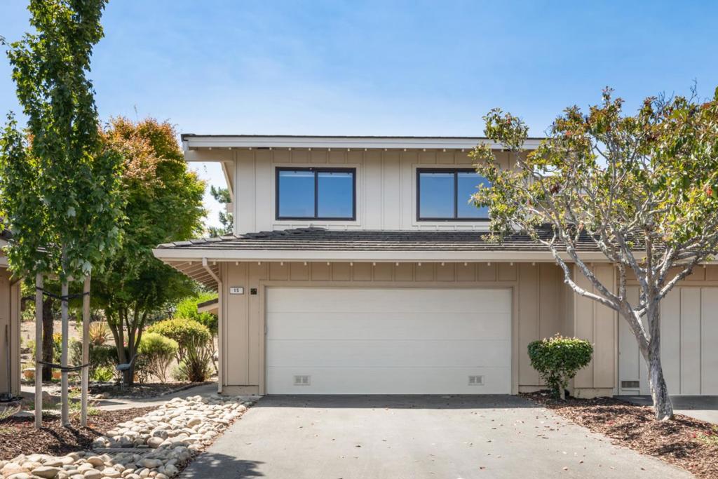 Welcome to this beautifully updated 3-bedroom, 2.5-bath corner-unit townhome with peaceful hillside views, located in a quiet and private setting. This rare opportunity combines smart energy efficiency, comfort, and access to top-rated schools in a well-maintained community. Energy-saving features include an owned 5.95 kW solar system, battery backup, a high-efficiency heat pump, and central A/C. The home has been thoughtfully remodeled and consistently maintained by its owner. The main level offers a comfortable flow between living, dining, and kitchen spaces, complemented by smart home upgrades, brand new stainless steel appliances, and tasteful finishes throughout. Upstairs features three well-proportioned bedrooms, including a bright and spacious primary suite with generous closet space and serene views. The updated 2.5 bathrooms and versatile third bedroom in this townhome offer options for guests, family, or a home office. A private driveway provides more parking than neighboring units. The attached 2-car garage includes an EV charger for added convenience. Ideally located near major tech campuses, scenic trails, and commuter routes, this home offers long-term value and a balanced lifestyle on the mid-Peninsula.