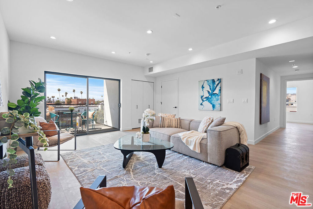Specious 3 BED +3 FULL BATH North East Corner Unit. SPECIAL BUILDER FINANCING 4.5% WITH 2-1 BUYDOWN AVAILABLE! DON'T MISS THIS BRAND NEW CONSTRUCTION LUXURY CONDO IN THE HEART OF KOREATOWN WITH VIEWS, VIEWS, VIEW. fashion modern styling, sleek architecture, center courtyard with glass railings and gym! Luxury living, great floor plans, awesome views, large balconies. INCLUDED APPLIANCES ARE: REFRIGERATOR, DISHWASHER, MICROWAVE, STOVE RANGE, LG WASHER and LG DRYER! Large and elegant kitchens with beautiful warm flooring, great floor plans. Everything was carefully designed for easy living. Ideal location in Koreatown, arguably cannot get any better! Just 2 blocks from the California Market (Korean Supermarket w/ Restaurants and shops in the courtyard above), across the street from YMCA with gym and pool! Few blocks away from Wilshire Western Subway station. Near all the restaurants, shops and entertainment in town. Don't miss this special opportunity to live in a NEW BUILDING in KOREATOWN. Come before its gone! Pictures may be photos of a different unit.