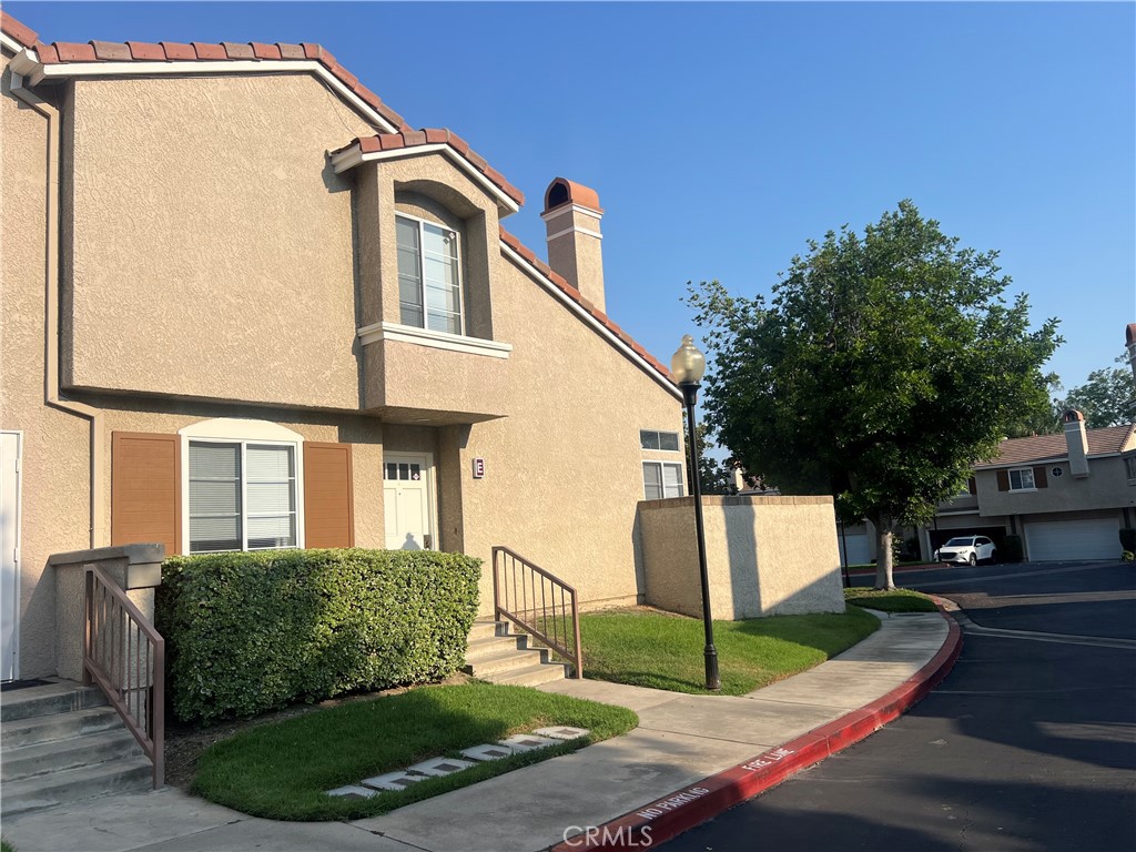 This inviting home features a bright living room with soaring ceilings. The main level includes one bedroom and one full bathroom—perfect for guests or multi-generational living. Upstairs, you’ll find two spacious suite-style bedrooms offering comfort and privacy.
Enjoy the convenience of direct access to a two-car garage and an indoor laundry room. The community offers wonderful amenities, including a pool and hot tub. Ideally located close to shopping plazas, parks, and the library.