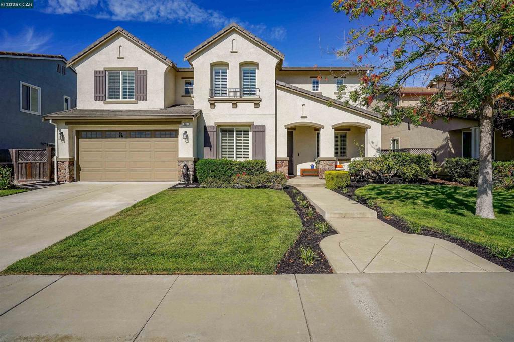 Discover Riata, one of Oakley’s most desirable neighborhoods nestled amongst vineyards and ranchettes, along the Brentwood border! Just across from Riata Park! This beautifully designed residence is filled with natural light and offers an expansive layout ideal for both everyday living and entertaining. The main level is built for connection and entertaining. A gourmet kitchen anchors the space with stainless steel appliances, double ovens, a built-in microwave, gas cooktop, oversized island, and walk-in pantry as well as an ample dining nook. The inviting family room features a cozy gas fireplace, while the formal living and impressive formal dining room, w/ 20' volume ceiling, provides versatility for every occasion. Enjoy 4 spacious bedrooms plus a flexible bonus room—perfect as a second family room, homework/play room or guest space. The home also boasts 3.5 baths and a generous 3-car tandem garage while the lush, private backyard creates a serene retreat for gatherings, dining al fresco, or simply unwinding outdoors. Dual zone HVAC, recessed lighting throughout, laundry w/ sink upstairs and plantation shutters! So-close to Freedom High School, this home blends style, function, and comfort in one of the area’s most sought-after settings—an opportunity not to be missed!