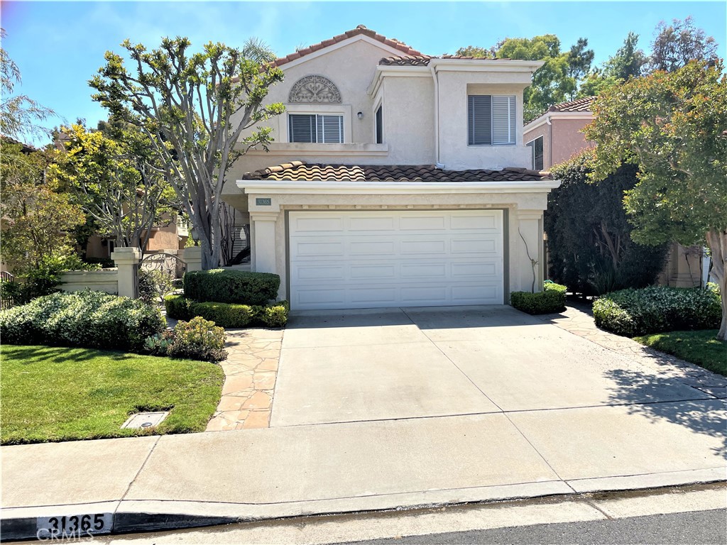 Hilltop Home peacefully located in the prestigious Vizcaya community of Laguna Niguel at Monarch Point. This home features 3 bedrooms, 2.5 bathrooms, totaling 2,406 square feet of comfortable living space. Appealing floor plan, as you enter this inviting home from a gated courtyard, you’re instantly greeted with high volume ceilings in the entrance, living room and an array of windows with plantation shutters allowing in an abundance of natural light. Formal dining room. Open gourmet kitchen with bar leading to the family room which includes exquisite granite counter tops, equipped with newer stainless appliances with an electric induction cooktop and convection oven. From the upgraded kitchen, breakfast nook, family room with a fireplace you won’t miss these sharp large picture windows to enjoy a peaceful view of the amazing, private, beautiful deep, large backyard impeccably landscaped complemented with a large grassy area surrounded by palm trees. An entertainer’s dream. Additional appointment include: brand new elegant wide-laminate wood flooring installed throughout the entire house,*On the second level, you’ll find a very spacious master suite with vaulted ceilings. *an extra-large retreat area which could be used for office space, fireplace, its own private deck balcony overlooking the spectacular, serene rear yard. Oversized master bathroom includes double vanities, walk-in closet, dressing area, separate glass enclosed step-in shower and whirlpool tub bathroom. Two secondary spacious bedrooms that share a balcony complete the upstairs. Convenient inside laundry located downstairs. Resort- style living. The prestigious Monarch Point coastal community provides amazing amenities and are just a short walk away, including ocean view pool, spa, tennis courts, and club house. Quick access to spectacular coastal ocean view hiking trails.
