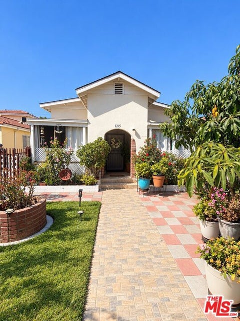 Photo of 1215 W 59th Street, Los Angeles, CA 90044 (MLS # 26996949)