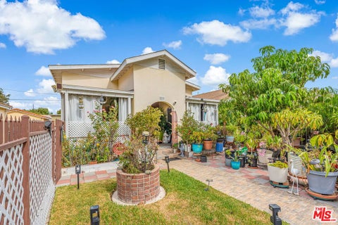 Photo of 1215 W 59th Street, Los Angeles, CA 90044 (MLS # 26996949)