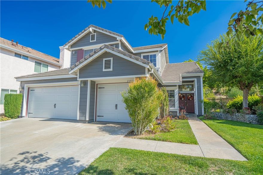 Home Is Where The Heart Is with this stunning former model home tucked away on a quiet cul-de-sac in the desirable Valencia Northbridge community. Featuring 4 bedrooms and 3 full bathrooms across 2,114 sq ft of living space, this thoughtfully designed residence offers both style and comfort.



Inside, you’ll be welcomed by soaring vaulted ceilings, expansive windows, and abundant natural light that highlight the formal living and dining rooms. The cozy family room, complete with a brick fireplace, creates a warm retreat for gatherings. The floor plan includes a convenient downstairs bedroom and bath, while upstairs you’ll find three additional bedrooms, each with ceiling fans, including a spacious primary suite with vaulted ceilings and a private en-suite bath. The heart of the home extends outdoors, where the kitchen and breakfast area open to an expansive pie-shaped lot of nearly 9,000 sq ft. A full-length covered patio provides the perfect setting for dining and entertaining, while the lush yard offers ample room for play, or gardening. Additional features include hardwood floors, a dedicated laundry room, and a 3-car garage offering generous storage space. Living in Northbridge means enjoying miles of greenbelt paseos and pedestrian bridges that connect you to parks, schools, and neighborhood centers. Residents also enjoy access to two exclusive community recreation centers with pools, spas, tennis courts, playgrounds, and clubhouses. All of this, just moments from top-rated schools, shopping, and dining. This is truly a rare opportunity to own a former model home on one of the best lots in Northbridge — a home where heart and lifestyle meet.